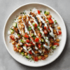 Chicken shawarma bowl with yogurt herb dressing