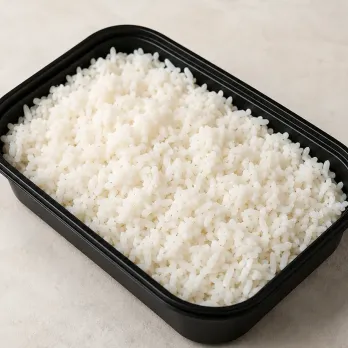 Thai Jasmine Rice in a black meal-prep container.