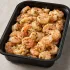 Pan Fried Garlic Shrimp in a black meal-prep container.