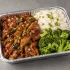 Teriyaki Chicken Family Bundle with glossy chicken, jasmine rice and broccoli in a half-size aluminum tray