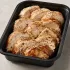 Pan Roasted Chicken Breast in a black meal-prep container.