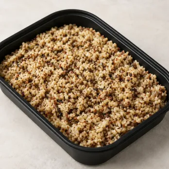 Whole Grain Medley in a black meal-prep container.