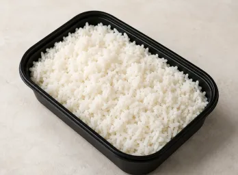 Thai Jasmine Rice in a black meal-prep container.