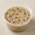 Mushroom Cream Sauce in a clear takeout sauce cup.
