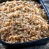 Whole Grain Medley sold by the ounce in a black meal-prep container.